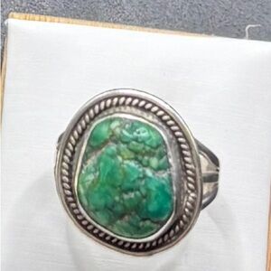 A Size 9 Turquoise stone in a Sterling Silver setting